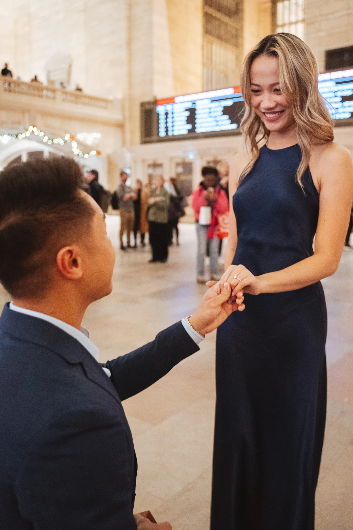 Ryan proposing to Huyen at Grand Central Terminal